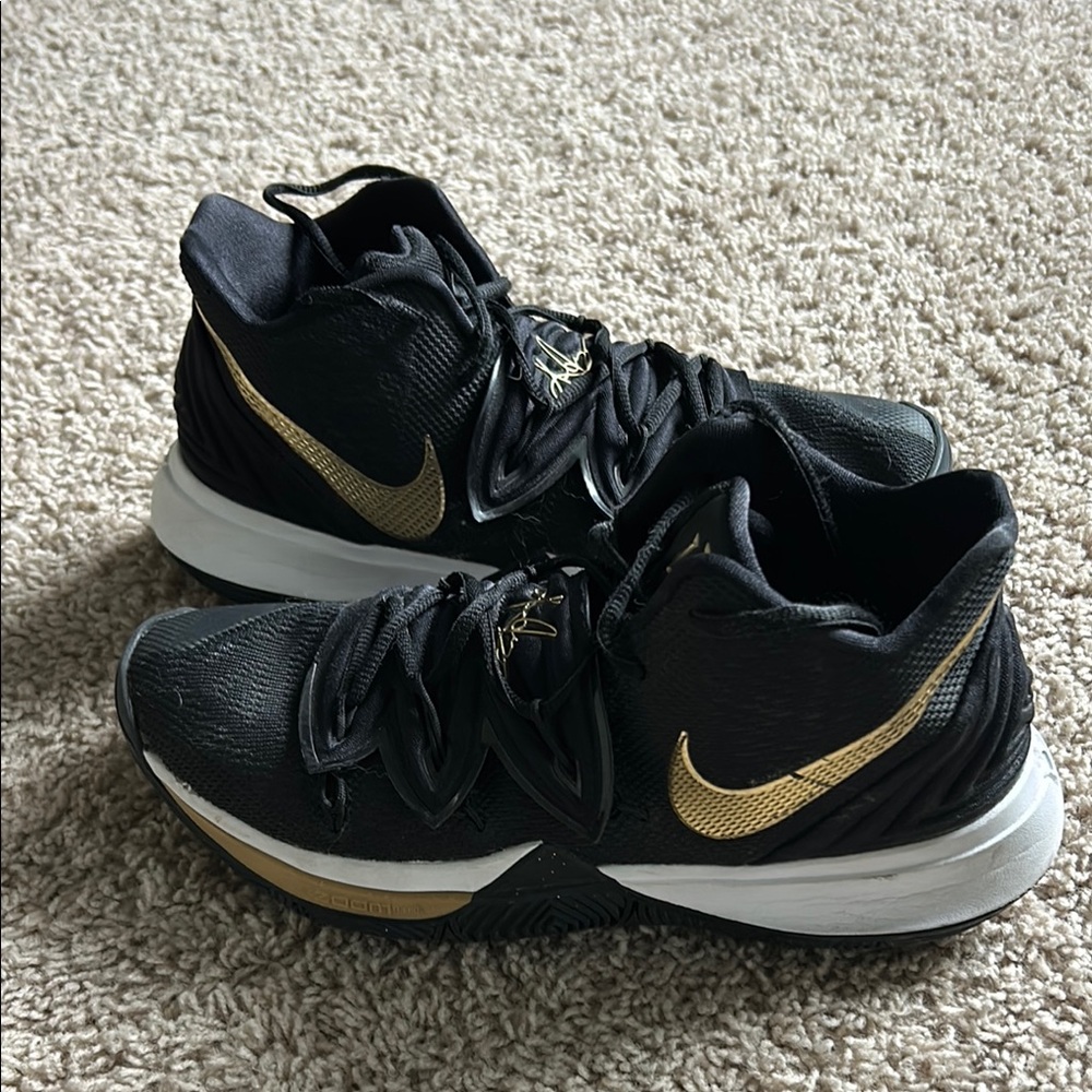 Nike Black and Gold Sneakers